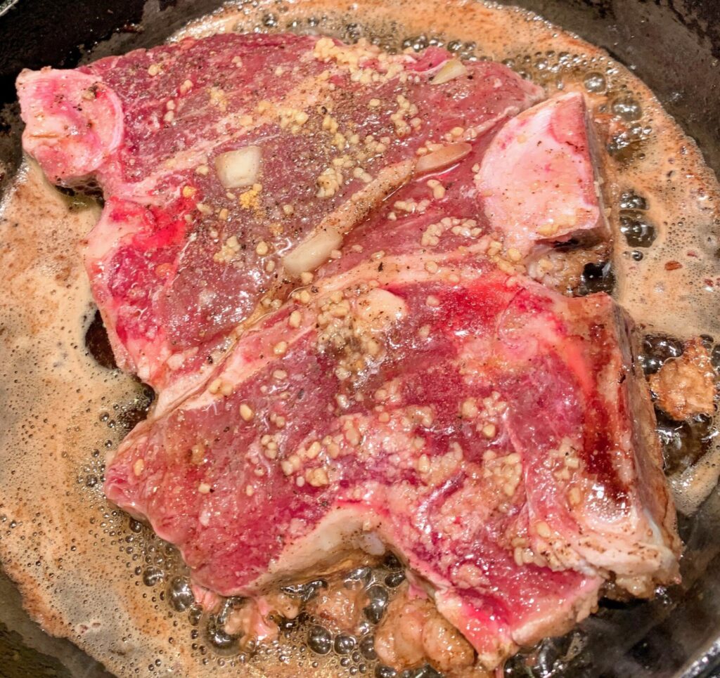 Seasoned Connolly Ranch steaks before cooking. 
